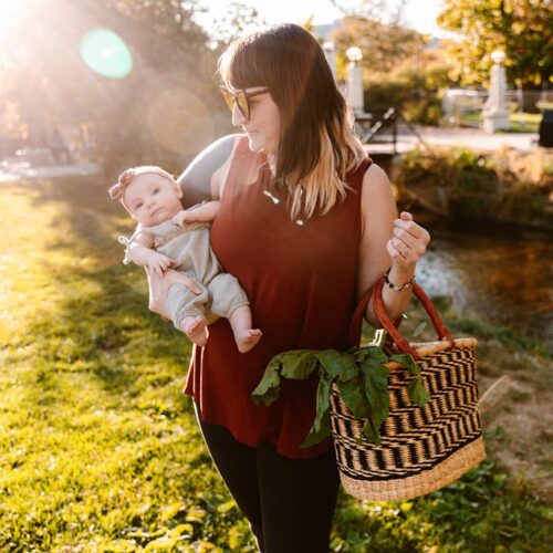 Mom with child and Oval African woven basket