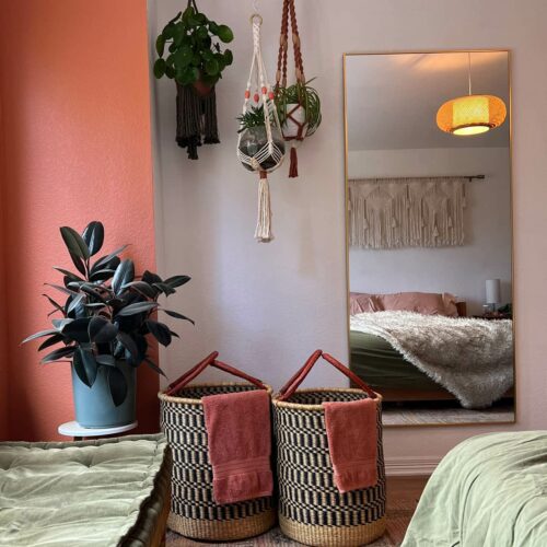 Two Laundry Baskets in a Bedroom