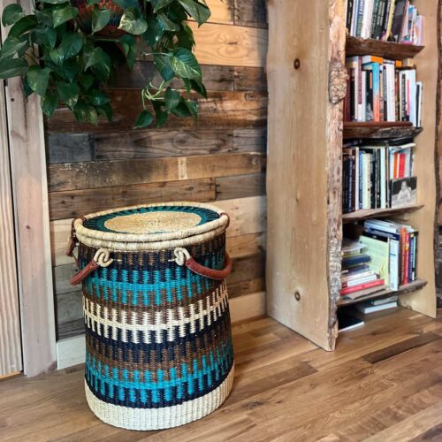 Colorful Laundry basket with lid in a home