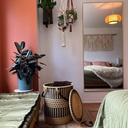 Laundry basket with lid in a bedroom
