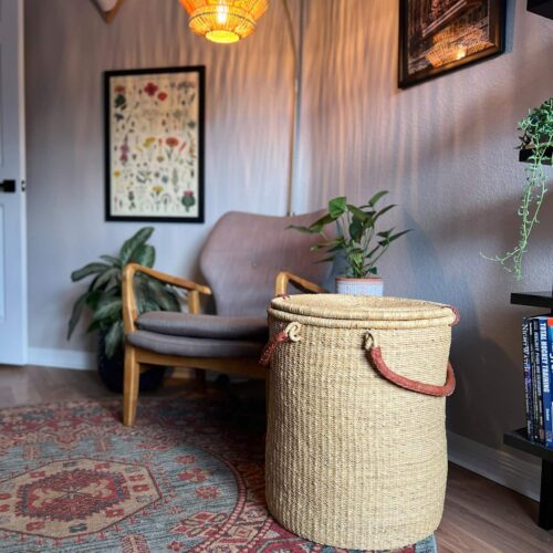 Natural woven laundry basket in a home