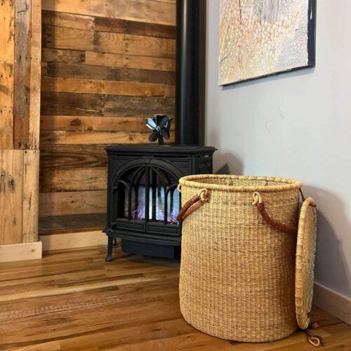 Natural woven laundry basket in a living room