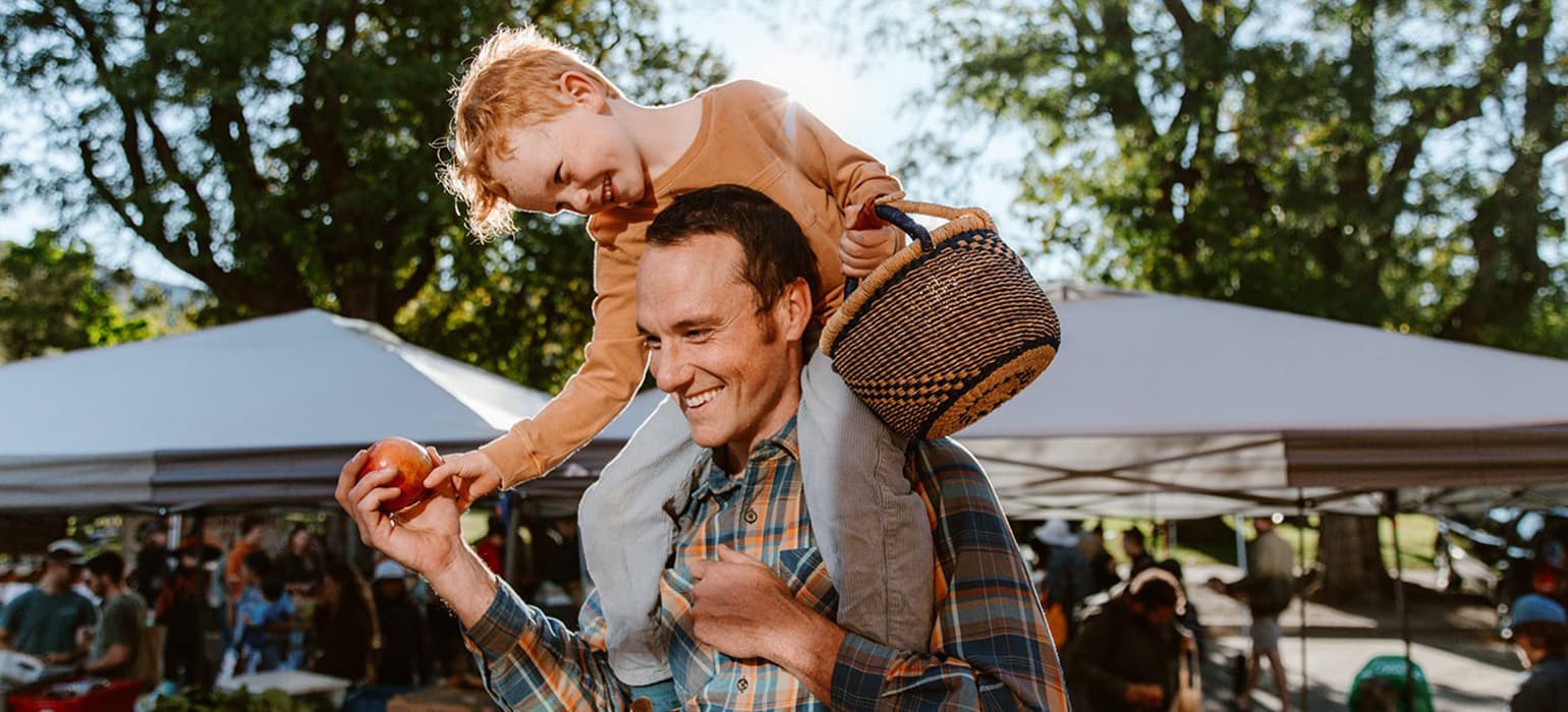 Father and Son in an outdoor market