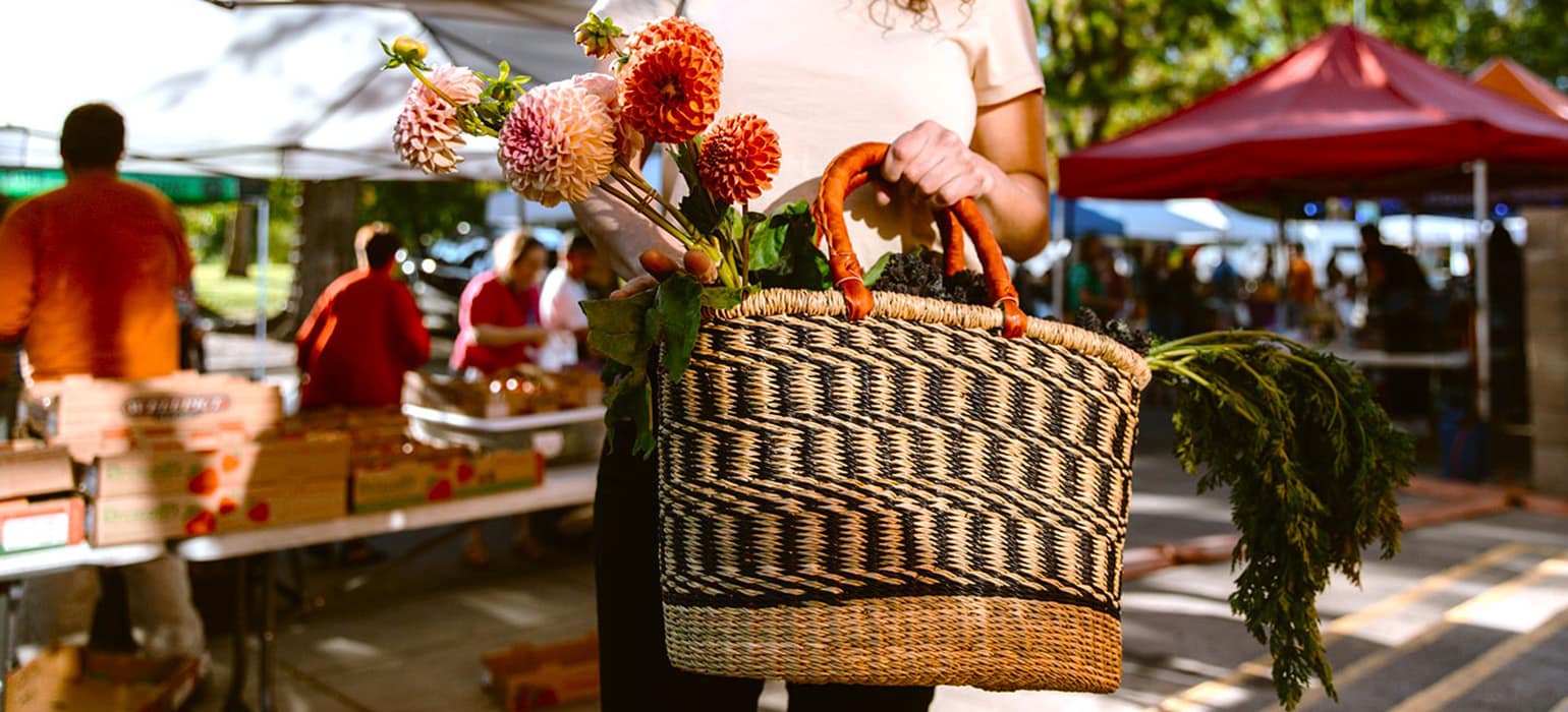 Woman in a Market with an African Basket