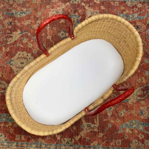 Foam Pad Liner inside a Moses Basket