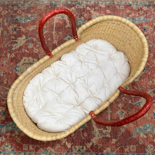 Futon Pad Liner inside a Moses Basket