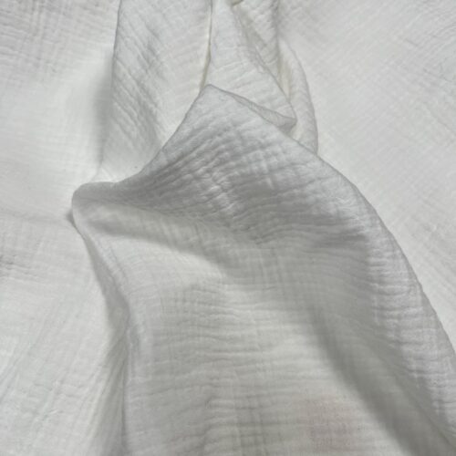Closeup of Off-white Double Gauze Moses Basket Sheet