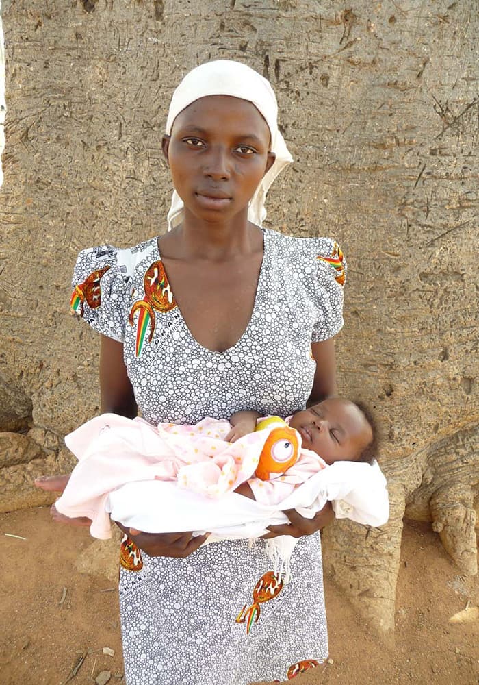 woman holding her baby